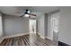 Spacious bedroom with hardwood floors and access to bathroom at 141 Kingston Ave, Daytona Beach, FL 32114