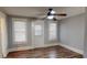 Dining area with hardwood floors and access to backyard at 141 Kingston Ave, Daytona Beach, FL 32114