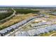 High-angle view of the community's layout, highlighting townhomes and green spaces at 2840 Isles Way, New Smyrna Beach, FL 32168