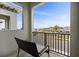 Relaxing balcony with view of the community and surrounding landscape at 2840 Isles Way, New Smyrna Beach, FL 32168