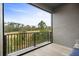 Private balcony overlooking scenic landscape and trees at 2840 Isles Way, New Smyrna Beach, FL 32168