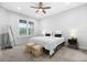 Bright bedroom with a king-size bed and plenty of natural light at 2840 Isles Way, New Smyrna Beach, FL 32168