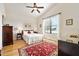 Spacious bedroom with hardwood floors and ceiling fan at 3189 Connemara Dr, Ormond Beach, FL 32174