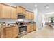 Modern kitchen with stainless steel appliances and granite countertops at 3189 Connemara Dr, Ormond Beach, FL 32174