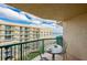 Relaxing balcony with ocean view; image virtually staged at 4565 S Atlantic Ave # 5601, Port Orange, FL 32127