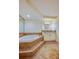 Bathroom boasts a large soaking tub and double vanity at 4565 S Atlantic Ave # 5601, Port Orange, FL 32127