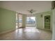 Bright living room with access to balcony and ocean view at 4565 S Atlantic Ave # 5601, Port Orange, FL 32127