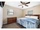 Spacious bedroom with ceiling fan and ample closet space at 627 Clark St, Daytona Beach, FL 32114