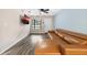 Living room with brown sectional sofa and hardwood floors at 627 Clark St, Daytona Beach, FL 32114