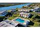 Waterfront condo buildings with community pool in aerial view at 66 Ocean Palm Villa S, Flagler Beach, FL 32136