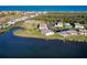 Aerial view of the community situated near the lagoon at 66 Ocean Palm Villa S, Flagler Beach, FL 32136