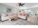 Bright living space open to the kitchen, featuring neutral tones, and an inviting atmosphere at 66 Ocean Palm Villa S, Flagler Beach, FL 32136