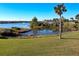 Scenic water view showcasing lush greenery, a picturesque waterway, and a sunny sky at 66 Ocean Palm Villa S, Flagler Beach, FL 32136