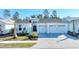 Charming two-story home with paved driveway at 707 Hang Loose Way, Daytona Beach, FL 32124