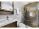 Bathroom with walk-in shower and modern vanity at 124 Avalon Dr, Ormond Beach, FL 32176