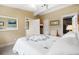 Main bedroom with comfortable seating and large mirror at 124 Avalon Dr, Ormond Beach, FL 32176