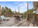 Deck with seating area and partial ocean view at 124 Avalon Dr, Ormond Beach, FL 32176