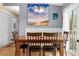 Casual dining area with wooden table and built-in bench at 124 Avalon Dr, Ormond Beach, FL 32176