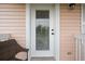 Exterior door and stairs leading to a home's upper level at 124 Avalon Dr, Ormond Beach, FL 32176