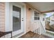 Exterior door and stairs leading to a home's upper level at 124 Avalon Dr, Ormond Beach, FL 32176