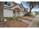 Front view of townhome showcasing landscaping and sidewalk at 3548 Forest Branch Dr # C, Port Orange, FL 32129