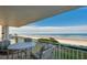 Balcony with table and chairs, ocean view at 4641 S Atlantic Ave # 2010, Port Orange, FL 32127