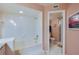 Clean bathroom with shower and bathtub at 4641 S Atlantic Ave # 2010, Port Orange, FL 32127