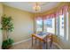 Cozy dining area with a small table and ocean view at 4641 S Atlantic Ave # 2010, Port Orange, FL 32127