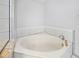 Corner bathtub with tile surround at 56 Winding Creek Way, Ormond Beach, FL 32174