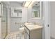 Bathroom with shower, vanity, and granite countertop at 56 Winding Creek Way, Ormond Beach, FL 32174