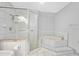 Bathroom with shower and corner bathtub at 56 Winding Creek Way, Ormond Beach, FL 32174