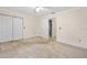 Spacious bedroom with ample closet space and carpeting at 56 Winding Creek Way, Ormond Beach, FL 32174