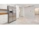 Modern kitchen with stainless steel refrigerator at 56 Winding Creek Way, Ormond Beach, FL 32174