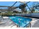 Refreshing screened pool with ample deck space at 56 Winding Creek Way, Ormond Beach, FL 32174