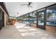 Relaxing screened pool area with patio furniture and bar at 56 Winding Creek Way, Ormond Beach, FL 32174