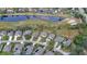 Aerial view of homes near golf course and lake at 1453 Sunningdale Ln, Ormond Beach, FL 32174