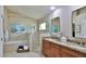 Elegant bathroom with double vanity and walk-in shower at 1453 Sunningdale Ln, Ormond Beach, FL 32174