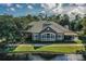 Community center with stone facade and covered patio at 1453 Sunningdale Ln, Ormond Beach, FL 32174