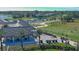 Golf course with cart staging area and scenic landscaping at 1453 Sunningdale Ln, Ormond Beach, FL 32174