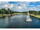 Picturesque lake with fountain and natural scenery at 1453 Sunningdale Ln, Ormond Beach, FL 32174