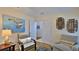 Relaxing office space with comfortable seating and access to a hallway at 1453 Sunningdale Ln, Ormond Beach, FL 32174