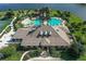 Resort-style pool and clubhouse with lush landscaping at 1453 Sunningdale Ln, Ormond Beach, FL 32174