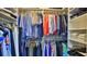 Large walk-in closet with ample shelving and hanging space at 1453 Sunningdale Ln, Ormond Beach, FL 32174