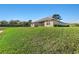 House with backyard view and pond at 1510 Kinnard Cir, Ormond Beach, FL 32174