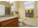 Small bathroom with single vanity and shower at 1510 Kinnard Cir, Ormond Beach, FL 32174