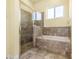 Bathroom with shower and bathtub at 1510 Kinnard Cir, Ormond Beach, FL 32174