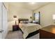Bedroom with desk and yellow patterned bedding at 1510 Kinnard Cir, Ormond Beach, FL 32174