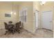 Small breakfast nook with round table and four chairs at 1510 Kinnard Cir, Ormond Beach, FL 32174