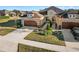Two-car garage home with a manicured lawn and driveway at 1510 Kinnard Cir, Ormond Beach, FL 32174