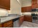 Kitchen with granite countertops and wood cabinets at 1510 Kinnard Cir, Ormond Beach, FL 32174